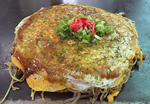 Okonomi Yaki: Cross-between pizza and a pancake; usually made with vegetables. Click on image to view larger size in a new window.