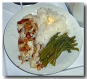 Almondine Sole with white rice and steamed asparagus.