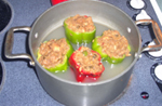 Asian Stuffed Peppers cooking in chicken broth.