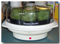 Artichokes in the steamer. Click on image to view larger size in a new window