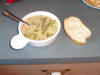 Eating Creamy Asparagus Soup with French bread.