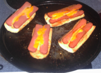 Baguette Franks preparation: after broiling. (Click on image to see larger size in a new window).