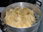 Steaming tamales